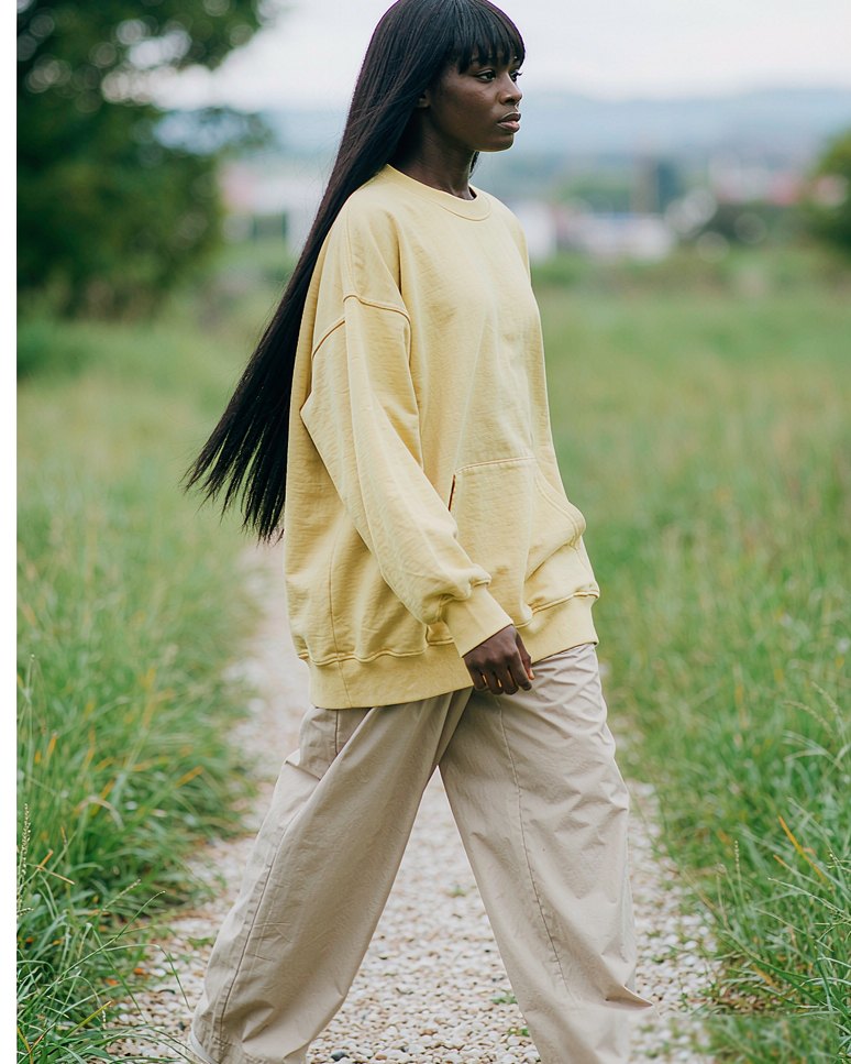 Crew Sweat in Butter Yellow worn by a model