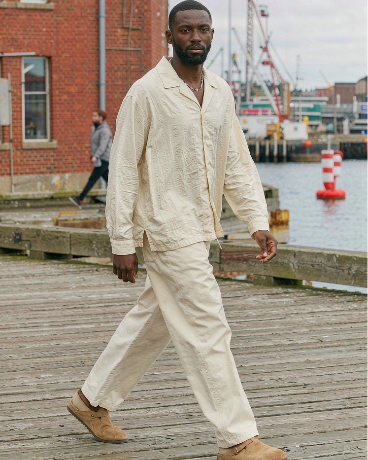 Linen Shirt in White worn by a model